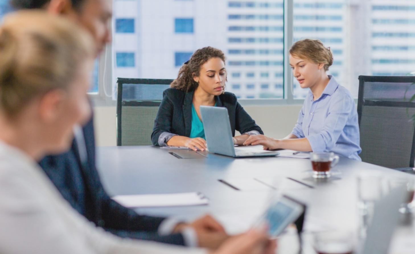 Financial professional presenting strategic insights to executive team